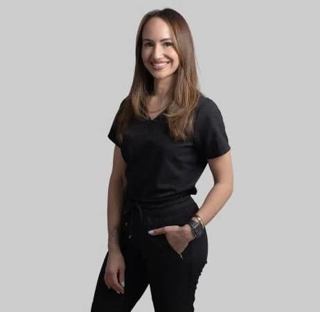 Kelsey, dental team member at Paradise Valley dental practice, smiling in professional portrait.