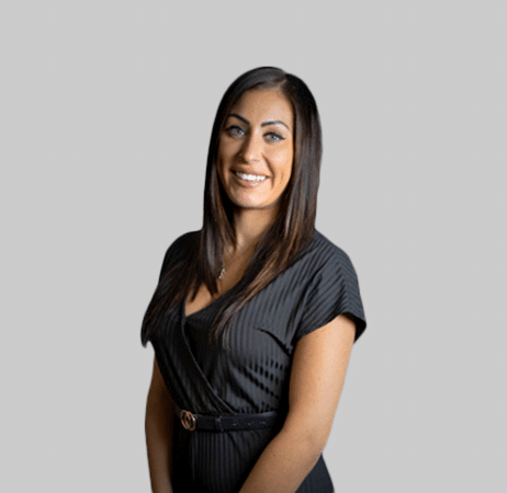 Alessia, dental team member at Paradise Valley practice, smiling in professional portrait.