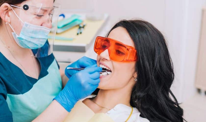 Dentist examining patient's teeth during inlay or onlay treatment in Paradise Valley, AZ.